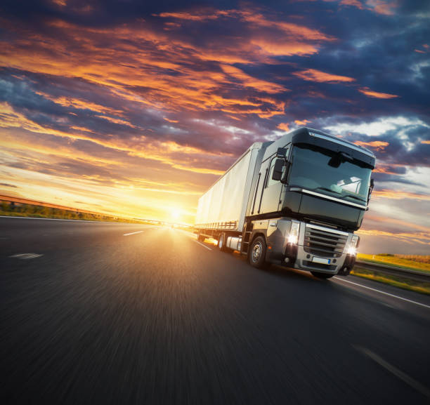 istock European truck vehicle with dramatic sunset light 1180257859