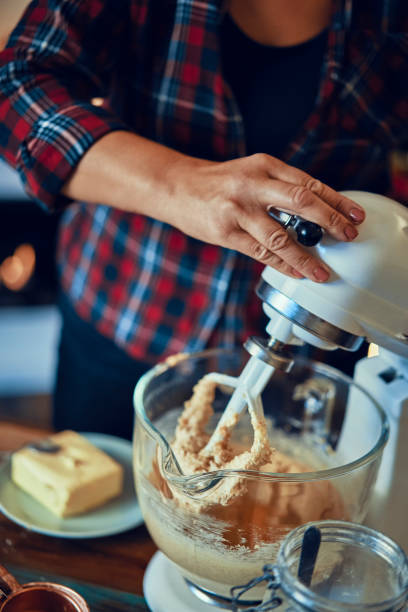 istock Preparing Christmas Cookies in Decorated Home Atmosphere 1180257934