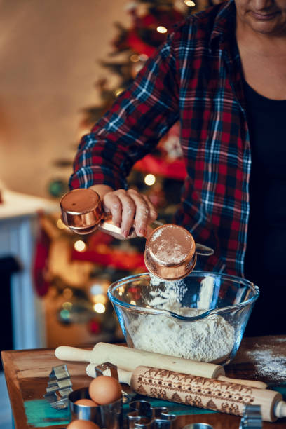 istock Preparing Christmas Cookies in Decorated Home Atmosphere 1180257936