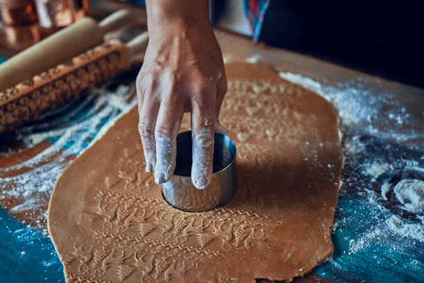 istock Preparing Christmas Cookies in Decorated Home Atmosphere 1180257963