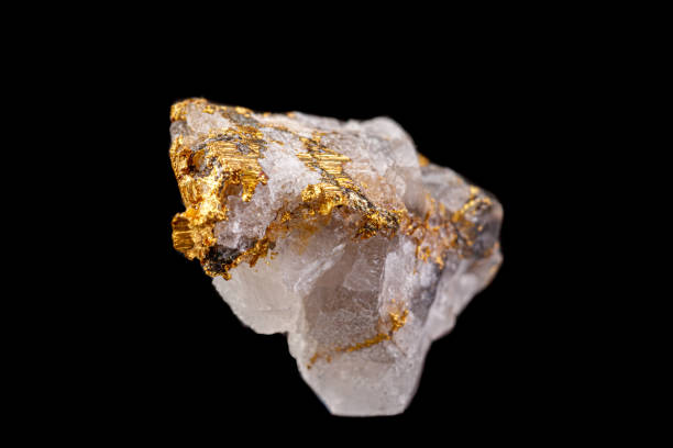 istock macro mineral stone gold in the rock on a black background 1180260340