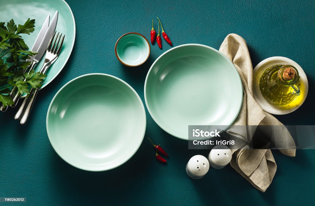 Empty Set Plate Set Of Empty Plates On A Blue Table Empty Serving Design Form Stock ...