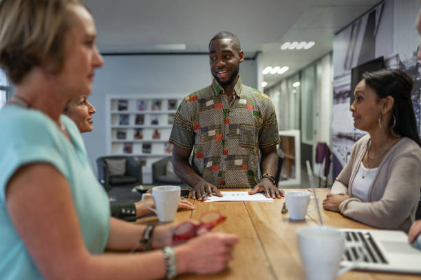istock Business People Discussing During Meeting In Office 1180262184