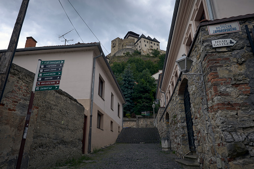 Photograph of the castle in the background and street life in Trenčín, Slovakia 02/08/2019