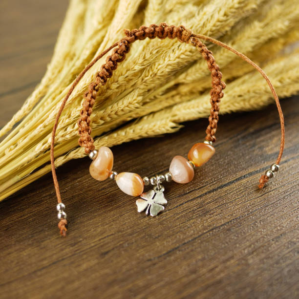 Brown bracelet on wooden background