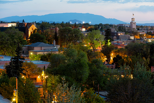 Aerial cityscape of Santa Fe with the Sangre de Christo mountains in the background. Santa Fe is the capital of the state New Mexico and oldest capital city in the United States.