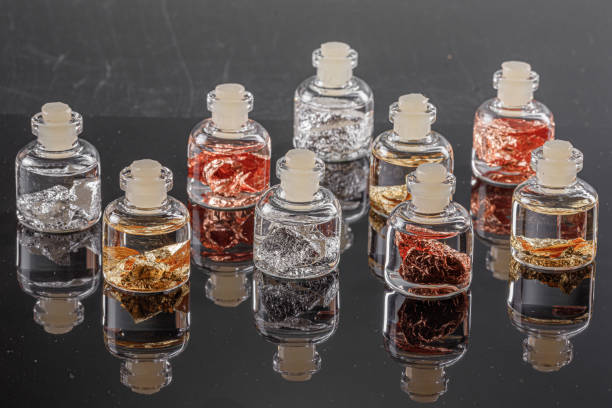 istock macro metal silver, gold, copper in a capsule on a gray background 1180265047
