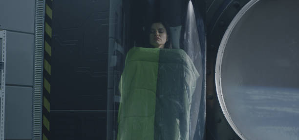 istock Female astronaut sleeping in a glass pod 1180266259