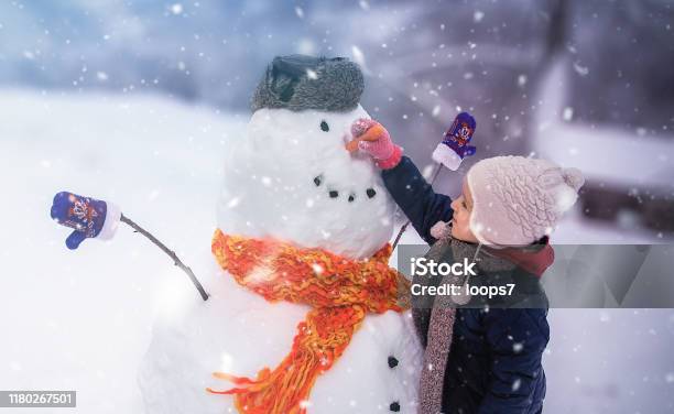 Child Winter Outdoor Fun Stock Photo - Download Image Now - Child, Winter, Snow