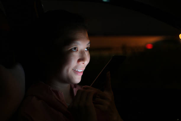 istock Connecting at Night - Smartphone 1180269361