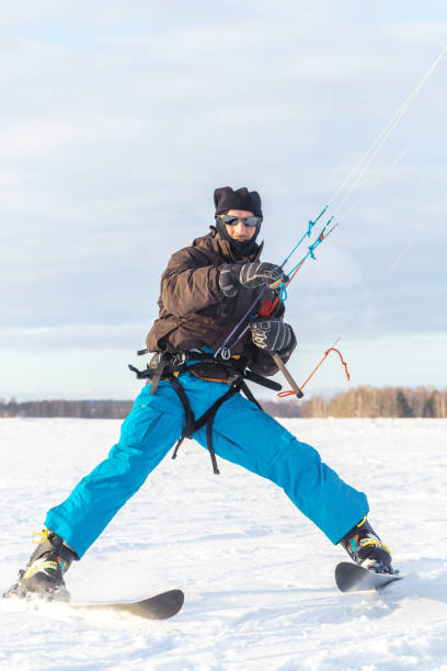 istock The skier goes on the snow field with kyte 1180270543