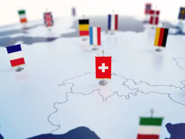 Photo of Flag of Switzerland in focus among other European countries flags