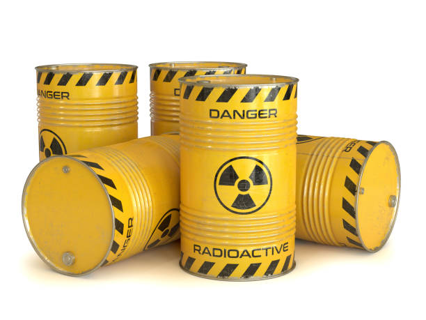 Radioactive waste yellow barrels with radioactive symbol stock photo