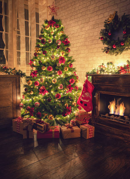 istock Decorated Christmas Tree Near Fireplace at Home 1180273584