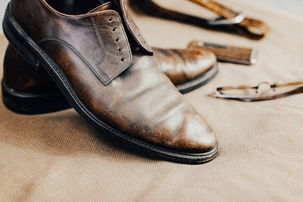 istock Brown leather accessories, shoes strap. 1180273640