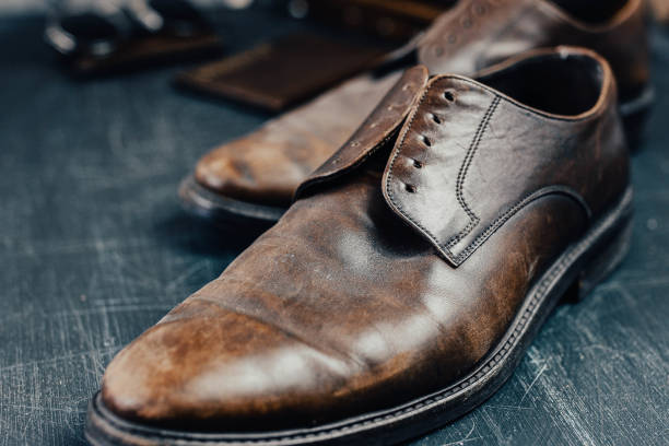 istock Brown leather accessories, shoes strap. 1180273672