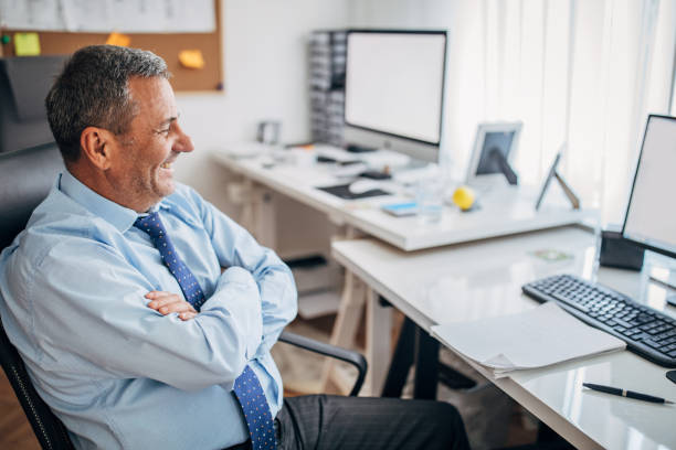 istock Cheerful senior businessman 1180278179
