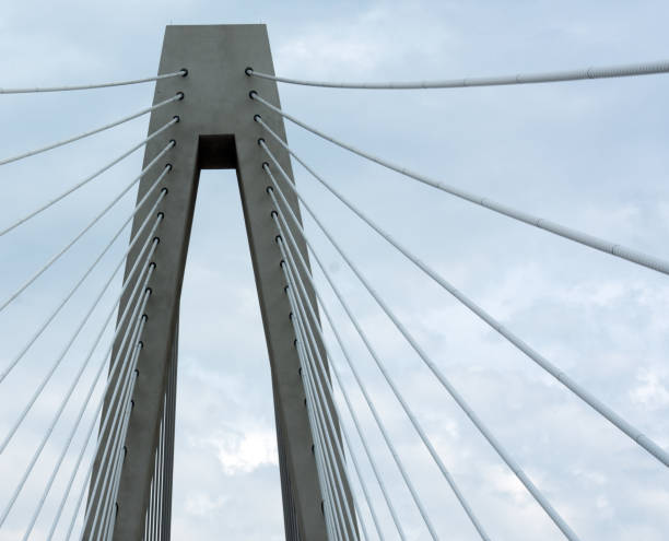 istock Close up of a bridge support and multiple cables. 1180283822