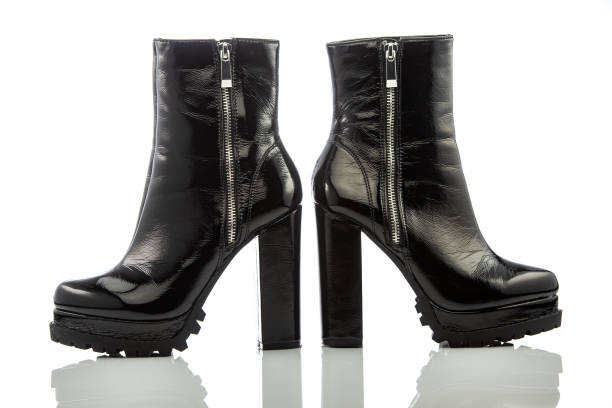 istock Black platform high heels ankle boots with chunky heel 1180288869