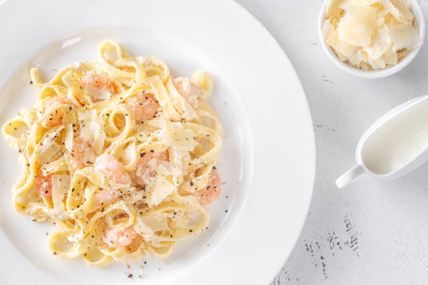 istock Portion of Shrimp Alfredo Pasta 1180297660