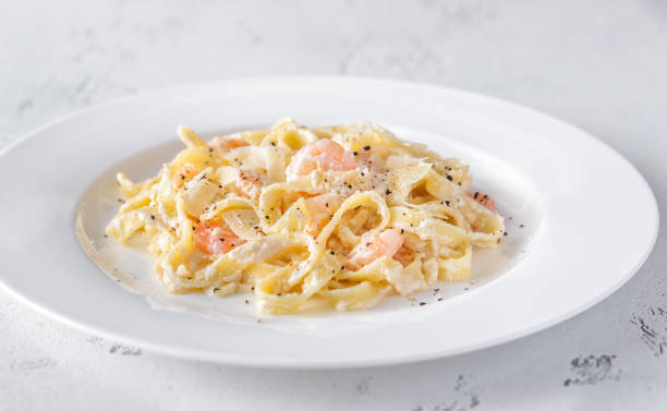 istock Portion of Shrimp Alfredo Pasta 1180297667
