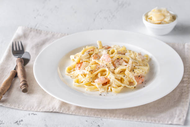 istock Portion of Shrimp Alfredo Pasta 1180297669