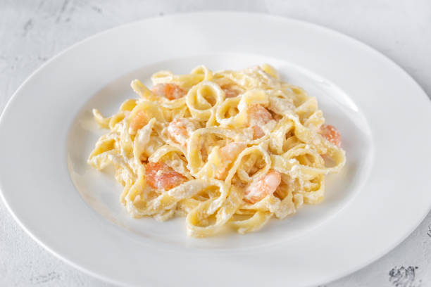 istock Portion of Shrimp Alfredo Pasta 1180297671