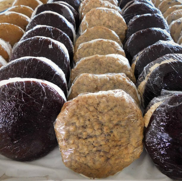 Delicious amish made whoopie pies Close up view of rows of different flavors of Amish made whoopie pies amish photos stock pictures, royalty-free photos & images