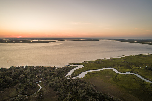 Drone view over Jekyll Island, Georgia's St. Andrews Beach Park near the island's southern tip.