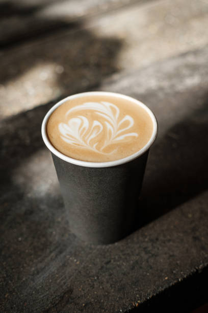 istock Beautiful Coffee Cup Froth Art Close-Up 1180306260