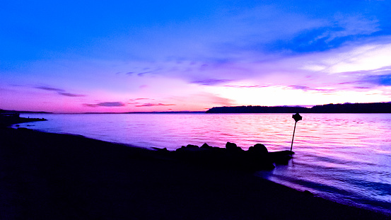 The sun setting over the Puget Sound in Mukilteo, WA.