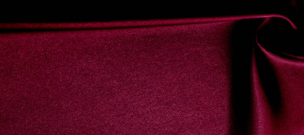 istock texture, red silk fabric panoramic photo. Silk Duke mood satin - beautiful and regal. It has a darker luster, then the usual satin on the one hand, has an average weight and has a more solid hand. 1180308303