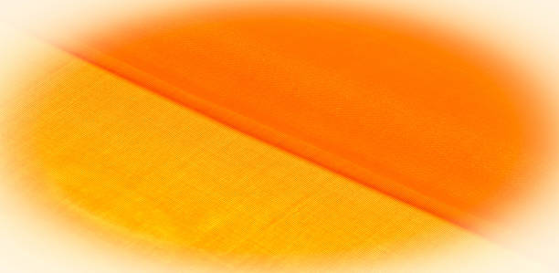 istock Texture of yellow silk fabric. It is also perfect for your design, clothes, posters. Be creative with beautiful project accents. This fabric is inspired by your inspiration. 1180308330