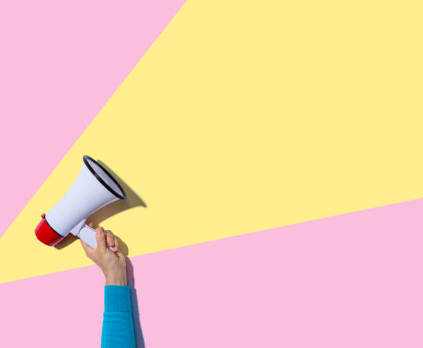 istock Person holding a megaphone 1180310109