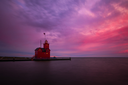Big Red Lighthouse at sunset on Lake Michigan.  Holland, Michigan, USA