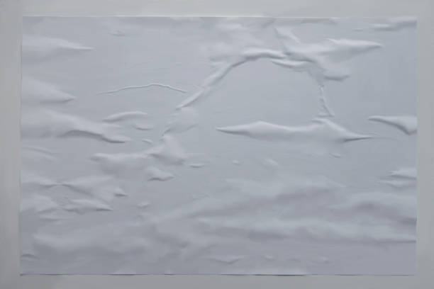 istock air pockets, wrinkled uneven white glued poster paper background effect 1180319132
