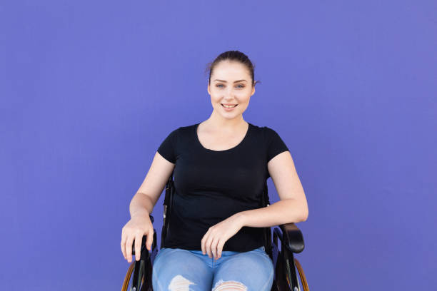 istock Confident Young Disabled Woman In Wheelchair 1180324055