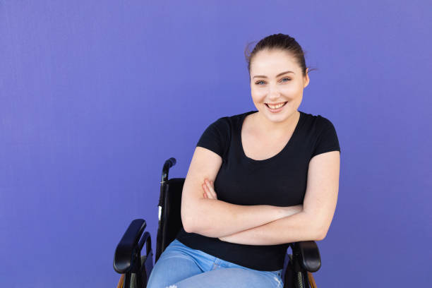 istock Confident Young Disabled Woman In Wheelchair 1180324078