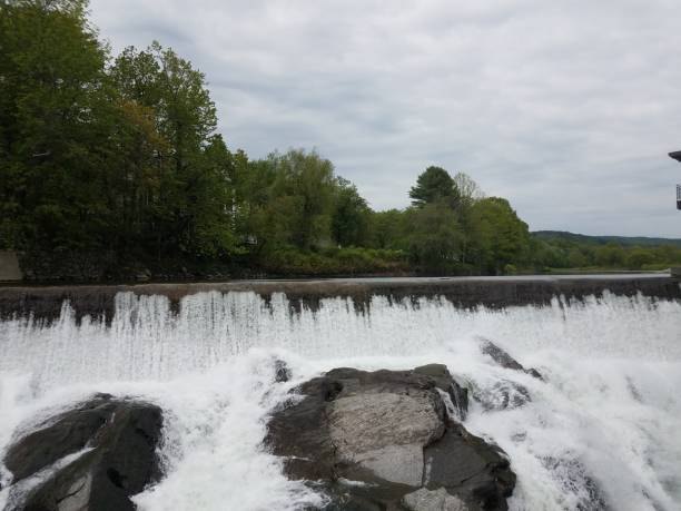 istock river with waterfall and rocks or boulders 1180338956