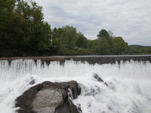 istock river with waterfall and rocks or boulders 1180338957