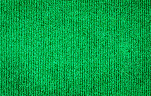 istock Green velvet fabric texture background 1180345740
