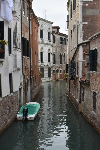istock Windows and walls at canal in Venice, Italy 1180346743