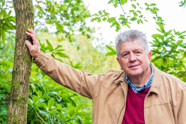 istock Active senior man in countryside portrait 1180347965