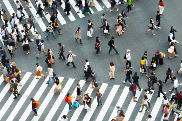 istock pedestrian crossing and crowd in Tokyo Japan 1180356603