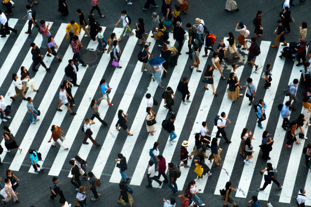 istock pedestrian crossing and crowd in Tokyo Japan 1180356611