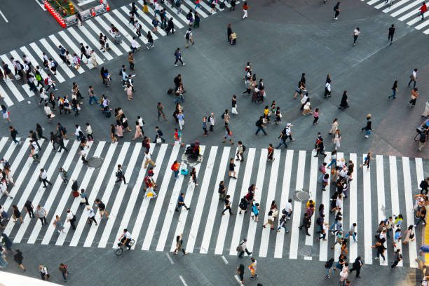 istock pedestrian crossing and crowd in Tokyo Japan 1180356629