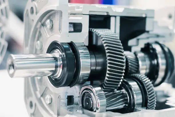 Mechanical gearbox, cross section. Helical gear Close-up