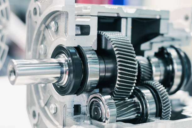 mechanical gearbox, cross section. helical gear. close-up - ball bearing imagens e fotografias de stock