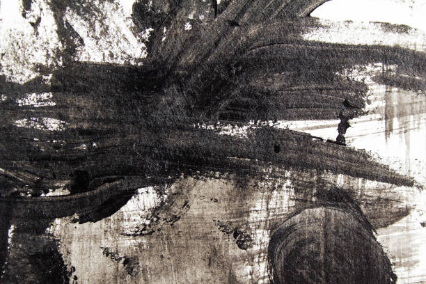istock Black acrylic brush strokes, scribble and stain on paper. Abstract grunge handmade drawing. 1180362896