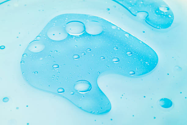 istock Oil bubbles in water, round abstract drops 1180364692